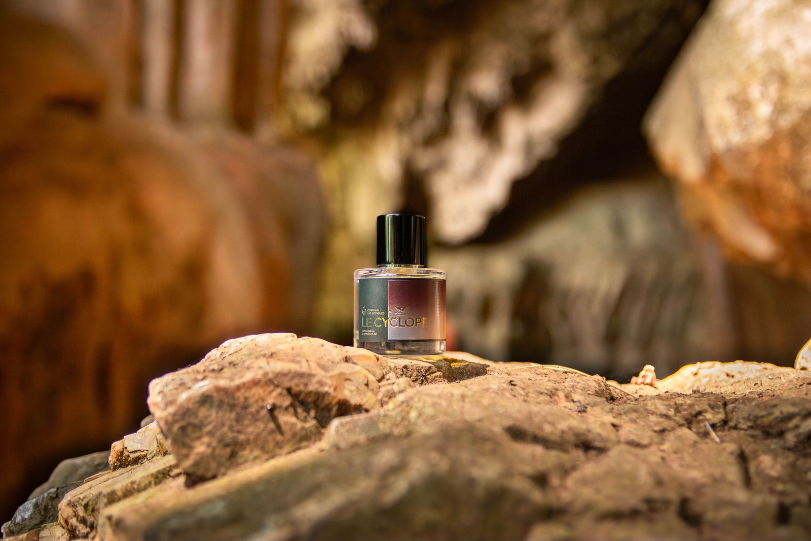 Le Cyclope eau de parfum on a rock inside a cave